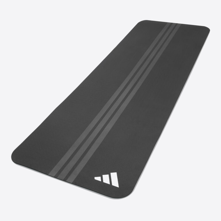 Adidas dubbelsidig yogamatta 6 mm – svart undersida. Den gröna ovansidan visas inte